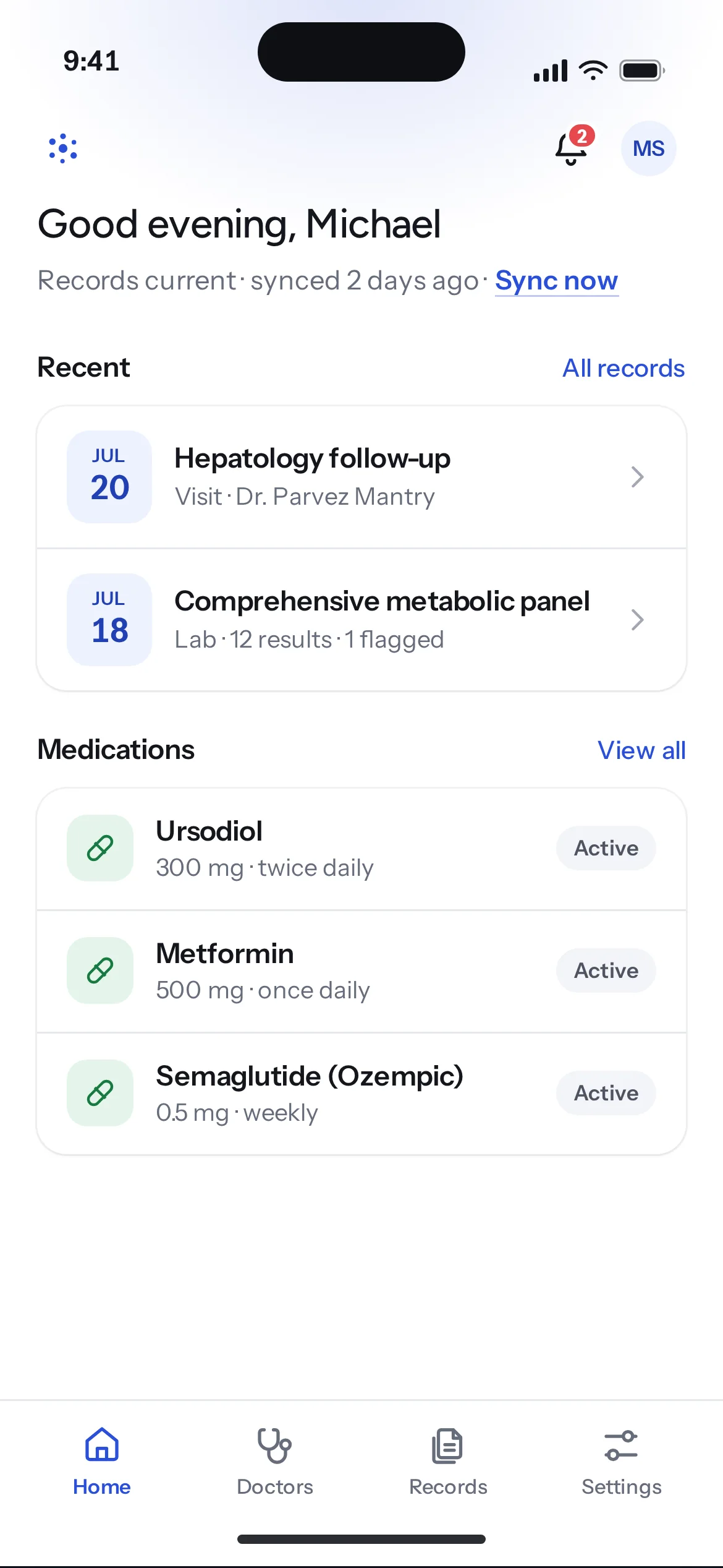 Consolidate Home: a quiet greeting, a line saying when records last synced with a cobalt link to check for updates, then recent visits and medications